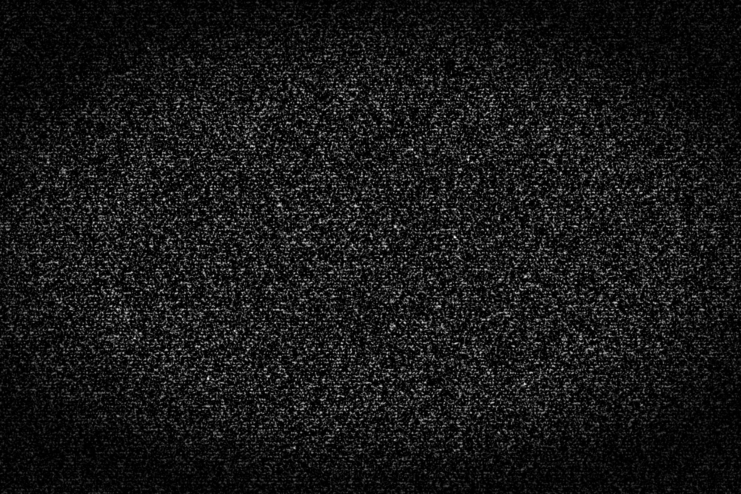 Dark black and white television static